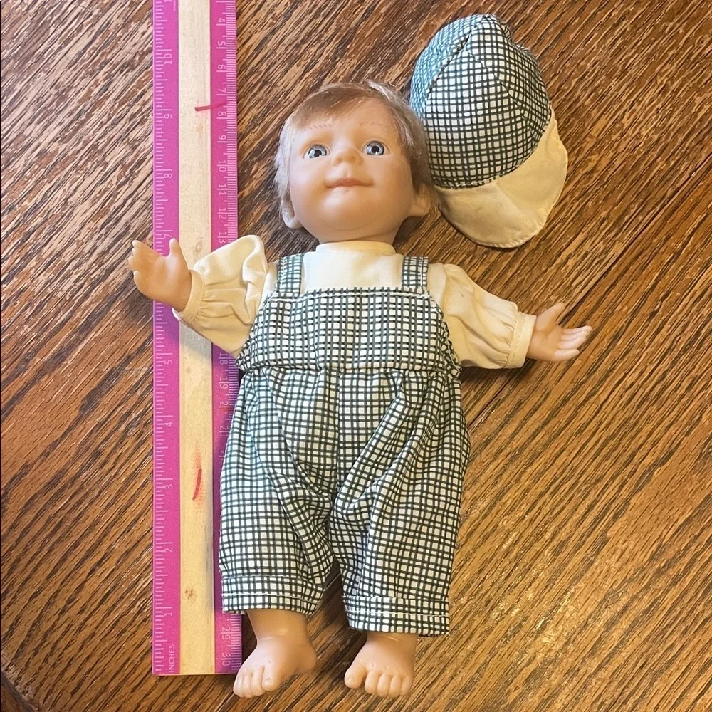 Adorable Baby Doll with Checkered Overalls